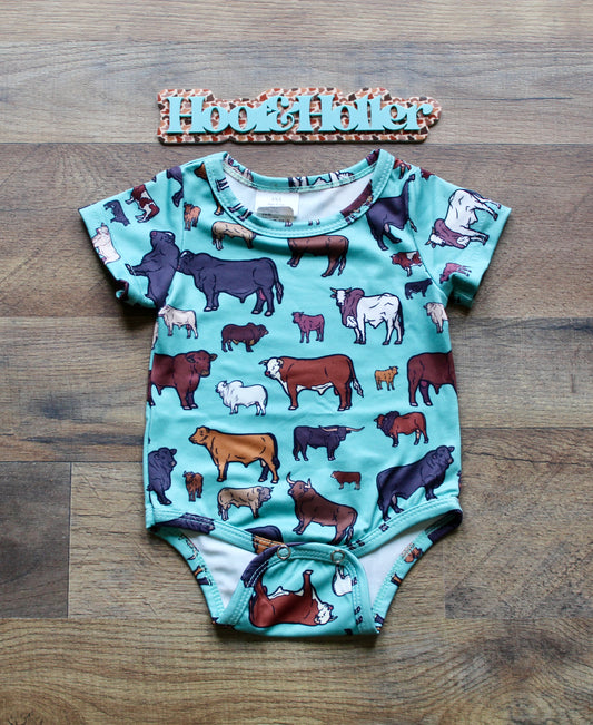 Turquoise Cow Onesie